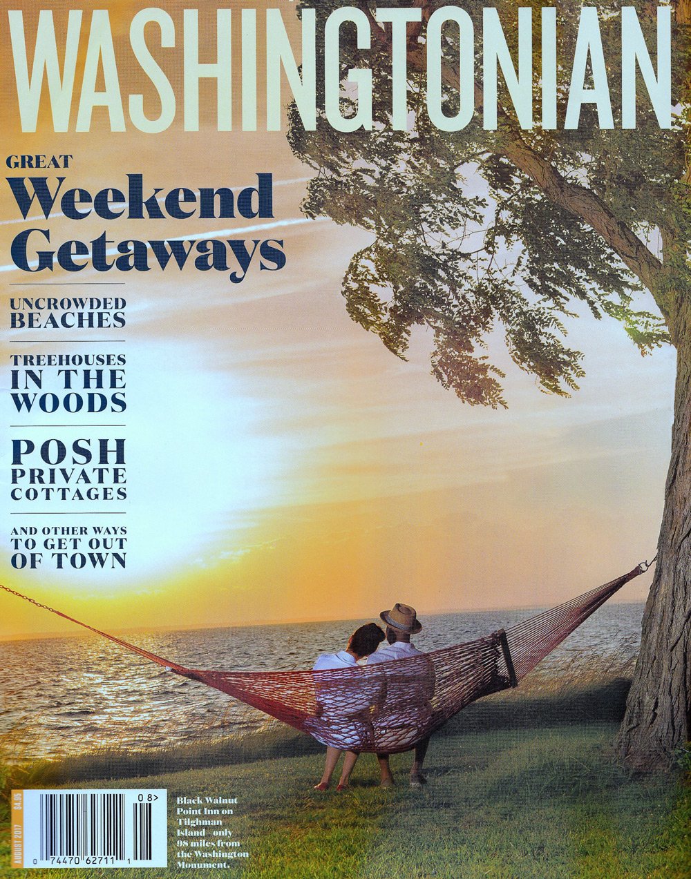 August 2017 Washingtonian magazine cover featuring a couple in a hammock at Black Walnut Point Inn overlooking the water at sunset, accompanied by headlines about weekend getaways.